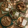 Five reclaimed-wood toy workshops, five philosophies of what play should feel like